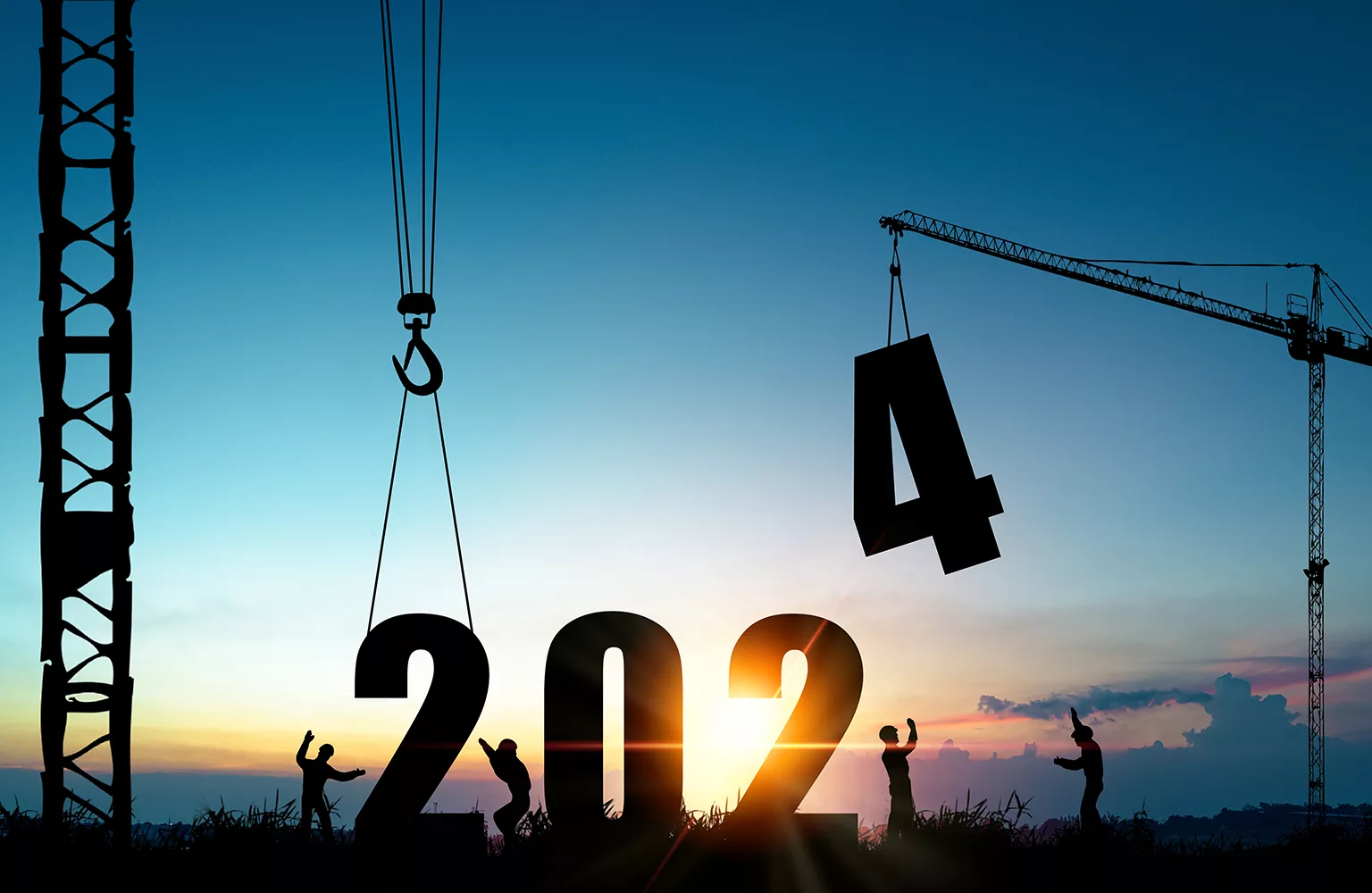 Silhouette of construction workers with crane