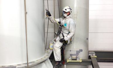 L&L Companies man painting with airbrush