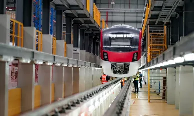 Railway Worker Goes Along the Train with a Check